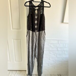Anthropologie Black Lace and Leaf Print Jumpsuit size Small
